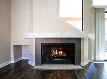 Modern fireplace with white mantel and dark surround